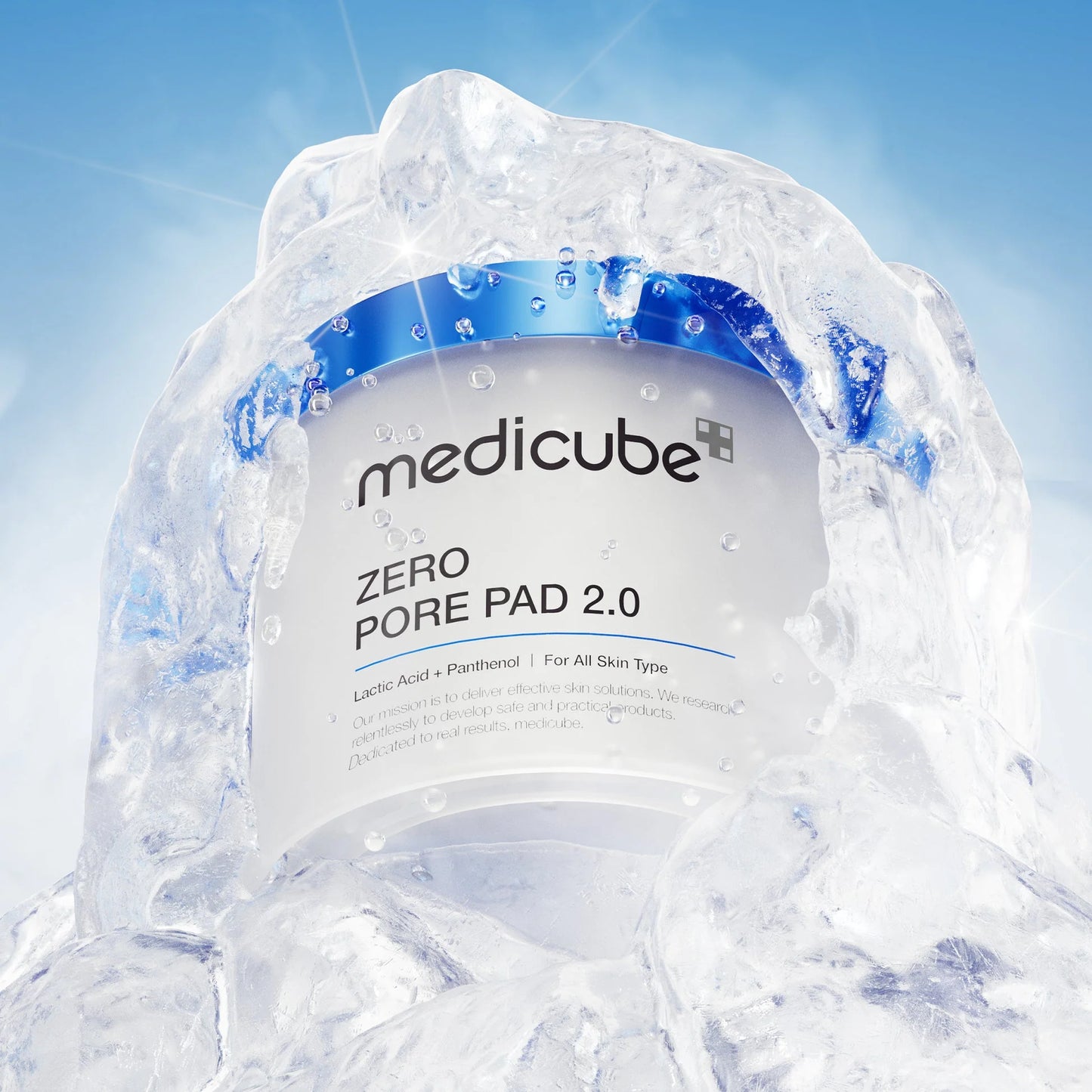 Medicube Zero Pore Pad 2.0 product with water droplets on a light blue background